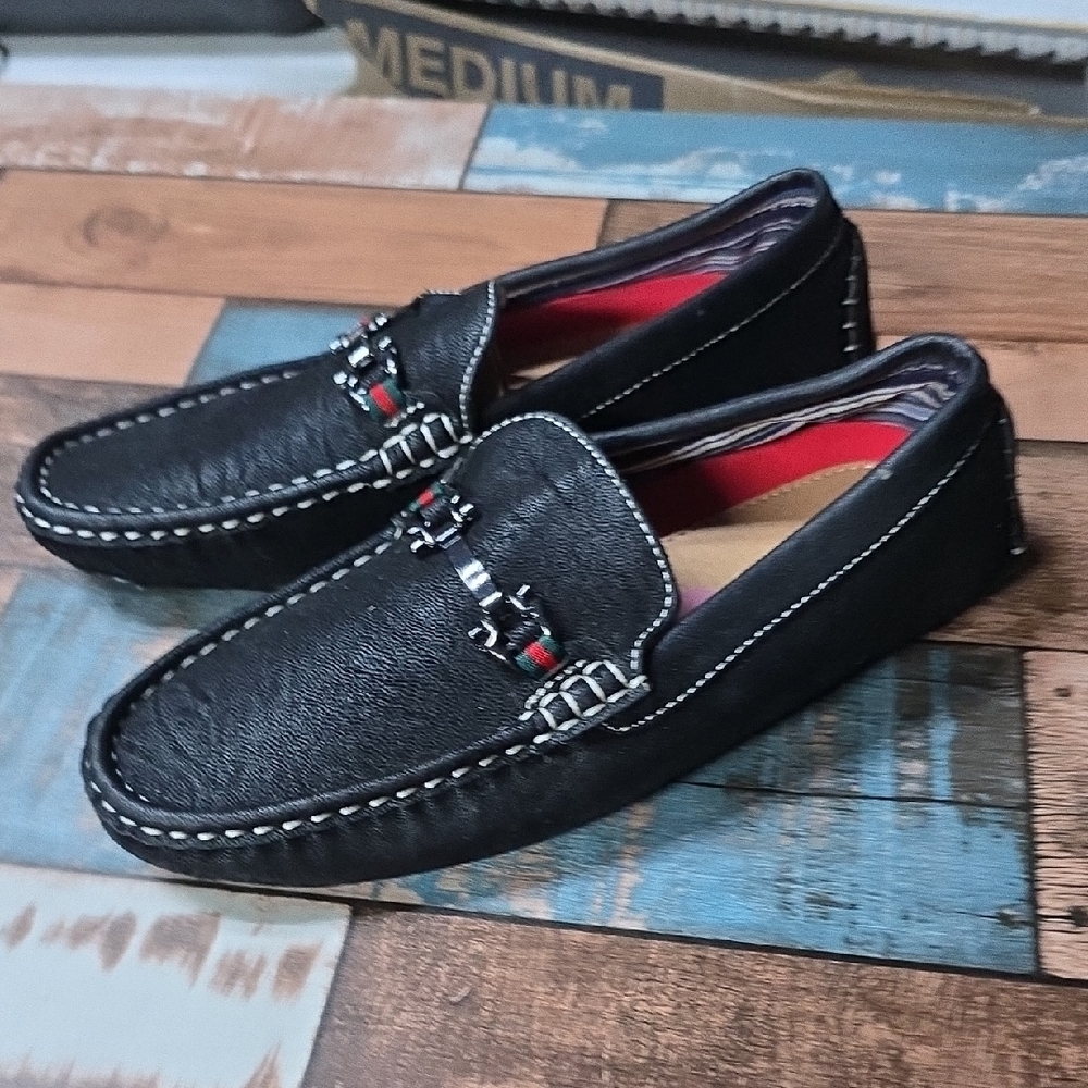 Stylish Black Leather Loafers with Metal Accents